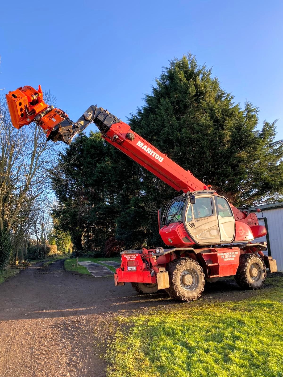 Manitou telehandler with woodcracker attachment on a farm in Meath
