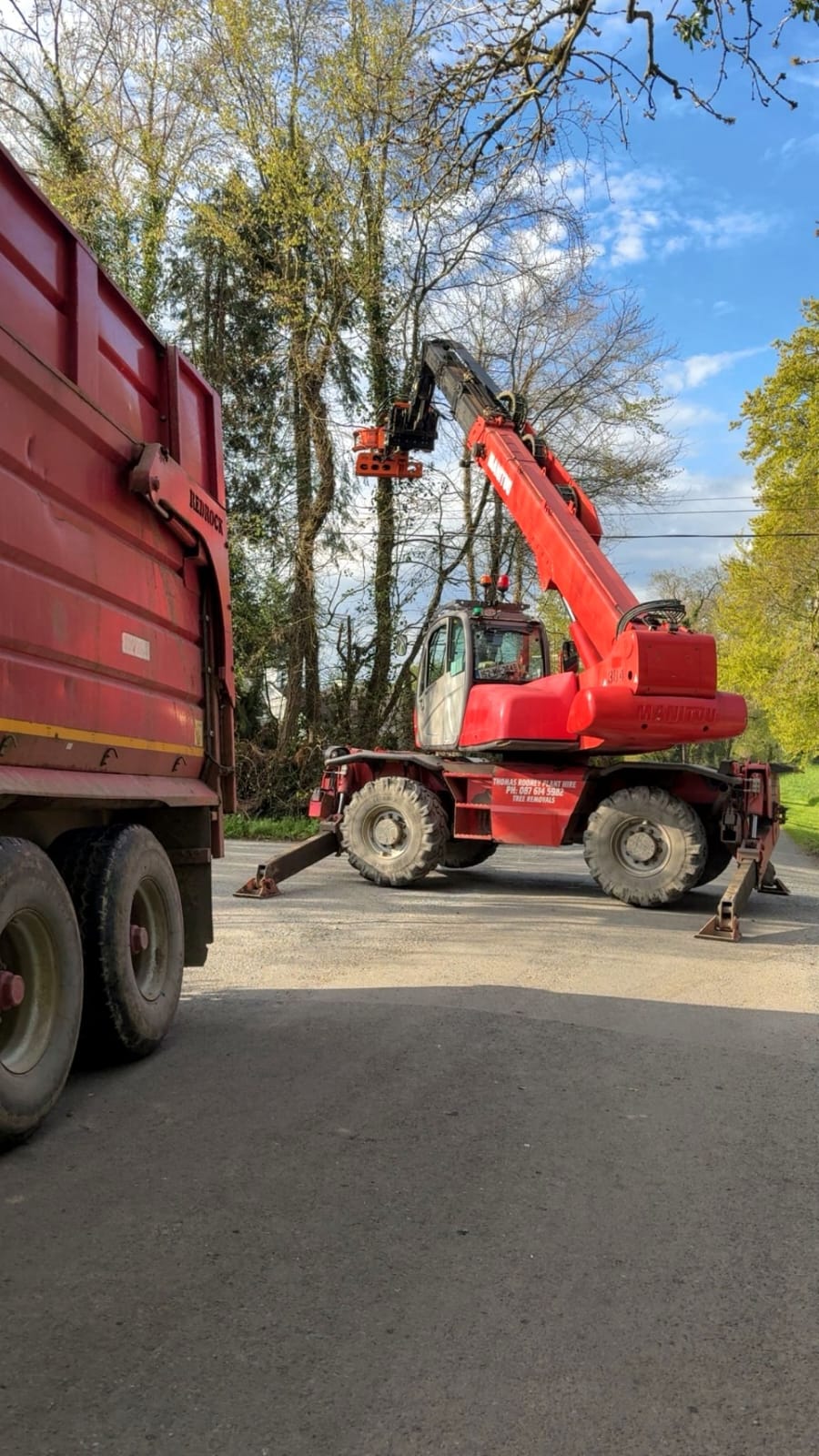 Manitou parked beside trailer for roadside tree removal in Meath